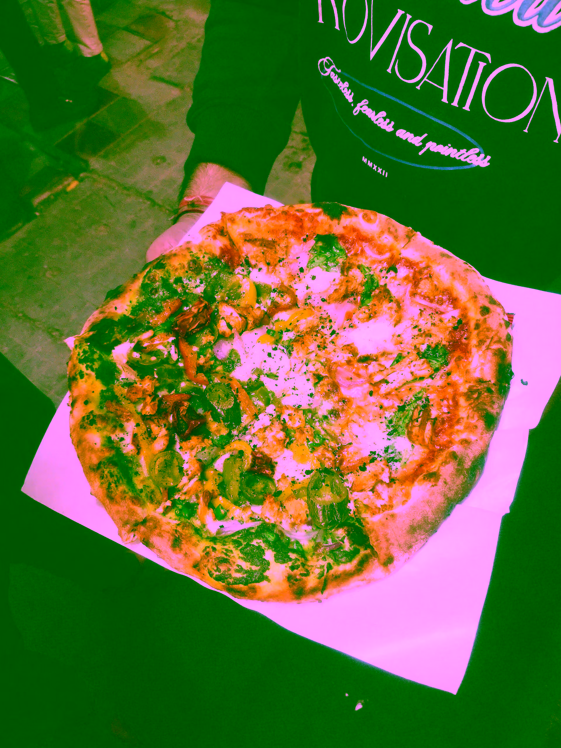 photo of some random half and half pizza